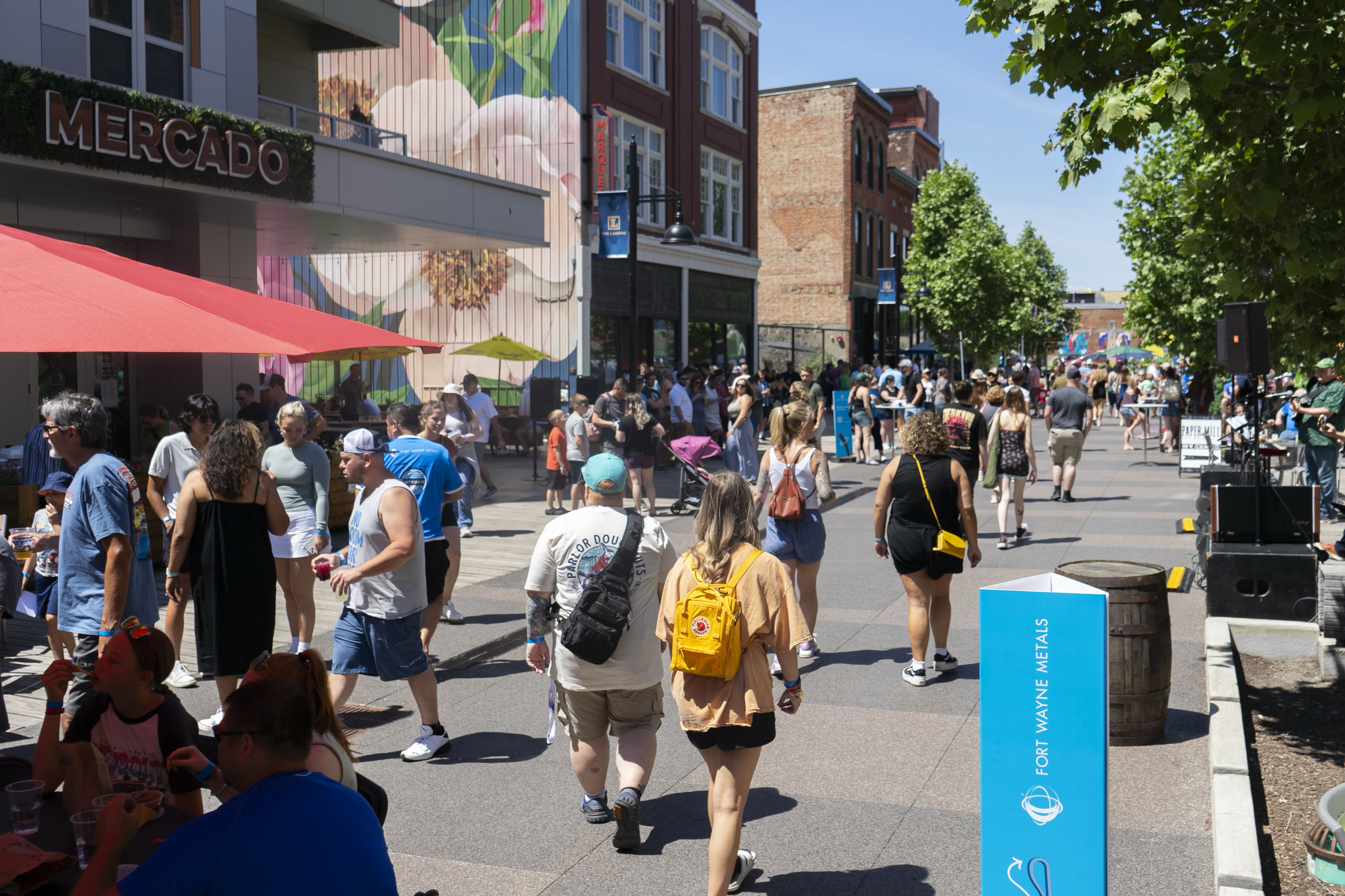 a photo showing the main street of the landing crowded with Fort Wayne Metals families